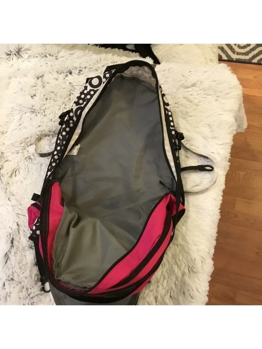 High Sierra pink black and White patterned backpack with suspension stra…